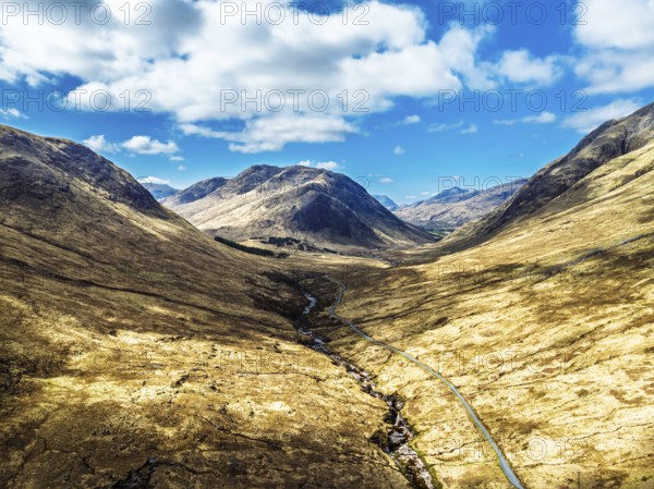 Mountains and Moors over Glen Etive Valley from a drone, Buachaille Etive Mòr, The Buachaille, Highlands, Scotland, United Kingdom