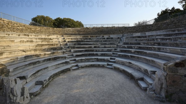 Historic amphitheatre with semi-circular stone steps and intense atmosphere, Ancient Theatre, Odeon, Kos Town, Kos, Dodecanese, Greek Islands, Greece