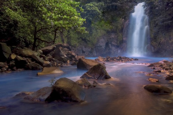 Costa Rica's Rio Celeste is formed through a mix of volcanic effects and the resulting chemicals and particulates that make up the water. I was fortunate to photograph this view (with magical light!) years ago before access was restricted to the waterfall. This shot couldn't be made today without explicitly breaking National Park Service rules