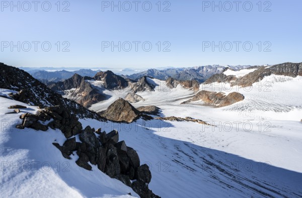 Snow on the Wilder Freiger mountain peak, picturesque high mountain landscape, view of Übeltalferner glacier and rocky mountain peaks Königshofspitz and Sonklarspitze, Stubai Alps, South Tyrol, Italy
