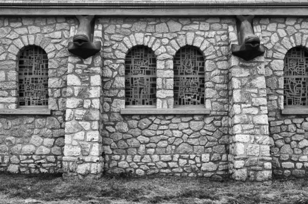 Side view, decorations, fish heads as gargoyles, church Chapelle Notre Dame de la Garde, black and white, Étretat, Normandy, Seine-Maritime, France