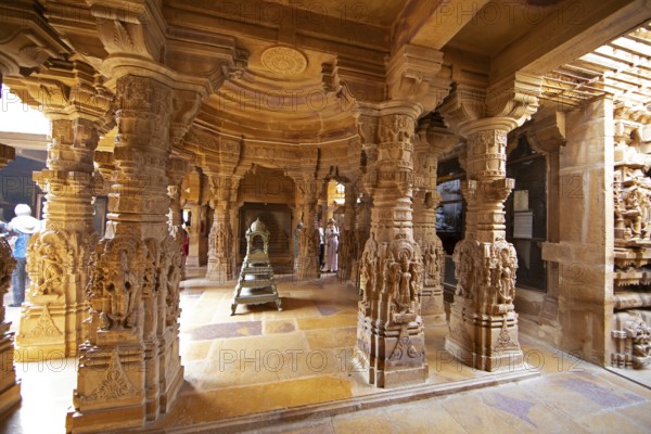 Sculptures on pillars in the Jain temple Chandraprabhu in the fortress in Jaisalmer, Rajasthan, India
