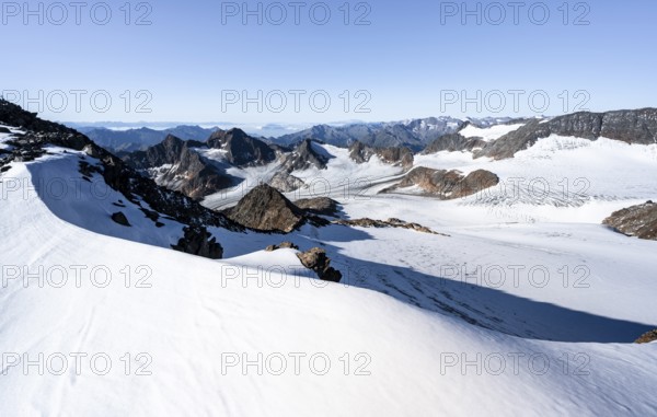 Snow on the Wilder Freiger mountain peak, picturesque high mountain landscape, view of Übeltalferner glacier and rocky mountain peaks Königshofspitz and Sonklarspitze, Stubai Alps, South Tyrol, Italy