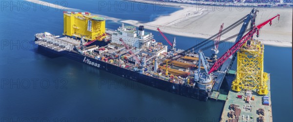 Pioneering Spirit. Workboat of the Swiss offshore service provider Allseas. The world's largest workboat for laying pipelines. It is the largest ship ever built in terms of gross tonnage and width. It is 382 metres long and 123 metres wide. From the end of 2018, it was busy laying the Nord Stream 2 pipeline in the Baltic Sea. Maasvlakte 2 deep-sea harbour, Rotterdam, Zuid-Holland, Netherlands
