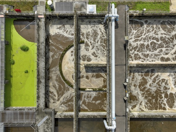 Germany - Wastewater treatment in a sewage treatment plant, clarifier with brown wastewater (symbolic photo) . The first purification stage of a sewage treatment plant comprises mechanical purification (removal of coarse solids, sand, fats), the second stage the biological process (removal of nutrients by means of micro-organisms), the third stage is known as chemical-physical treatment (phosphate precipitation) . In future, a fourth treatment stage will be necessary to remove trace substances, microplastics and medicines