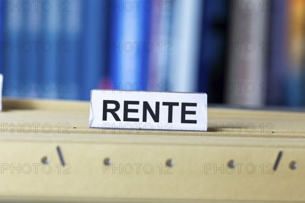 Pension symbol image: Sign with added inscription RENTE on a suspension file index