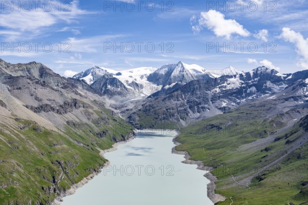 Blue mountain lake in a mountain landscape with glaciers, Lac des Dix reservoir and Mont Blanc de Cheilon peak, Valais Alps, Valais, Switzerland