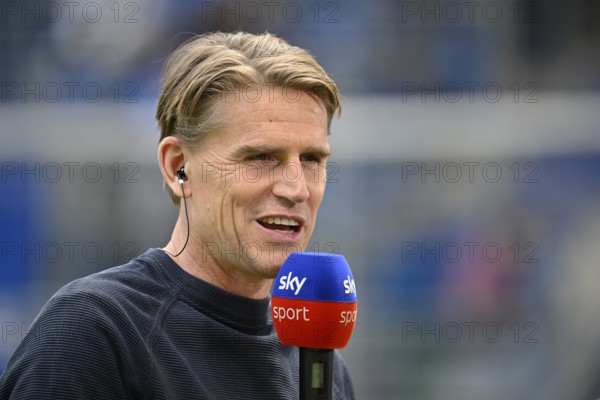 Sports Director Christoph Freund FC Bayern Munich FCB portrait in interview Microphone Micro Logo SKY PreZero Arena, Sinsheim, Baden-Württemberg, Germany