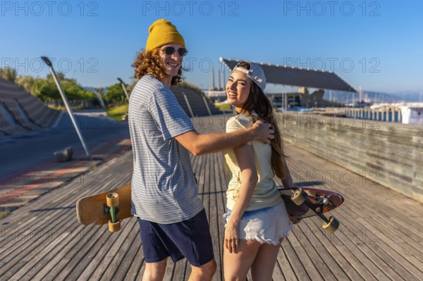 Smiling young adults skateboarding on a sunny boardwalk, capturing the essence of carefree summer fun and friendship in an urban setting
