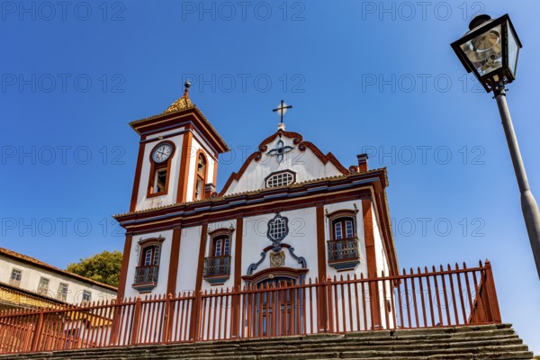 Facade of a colorful historic church in Baroque style in the old town of Diamantina in Minas Gerais, Diamantina, Minas Gerais, Brazil