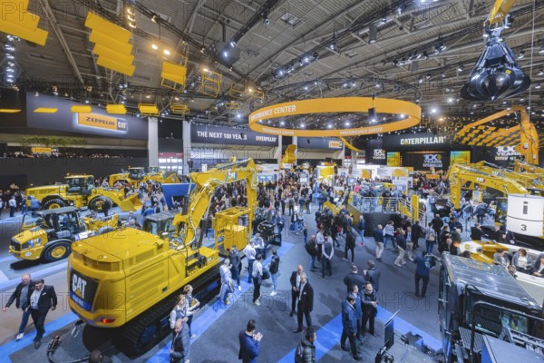 Construction machinery from the US company Caterpilar. BAUMA Munich, 34th World's Leading Trade Fair for Construction Machinery, Building Material Machines, Mining Machines, Construction Vehicles and Construction Equipment. In 2025, the trade fair will attract around 600, 000 visitors from more than 200 countries and regions and 3601 exhibitors. Open-air area with exhibits from Liebherr. Munich, Bavaria, Germany