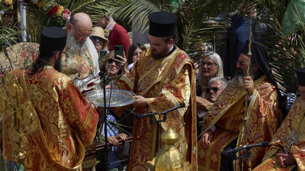 Priests with liturgical jewellery and robes perform a religious ritual with incense and prayers, Orthodox ceremony, monks of the Monastery of St. John, ceremonial washing of feet, procession, Maundy Thursday, Megali Pempti, Chora, Patmos, Dodecanese, Greek Islands, Greece