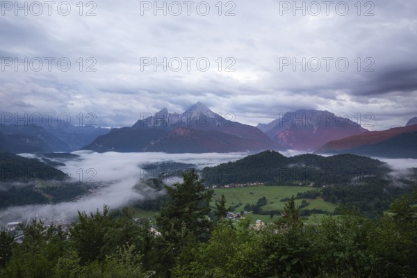 Marxenhöhe near Berchtesgaden with Watzmann view in the morning mist after the rain