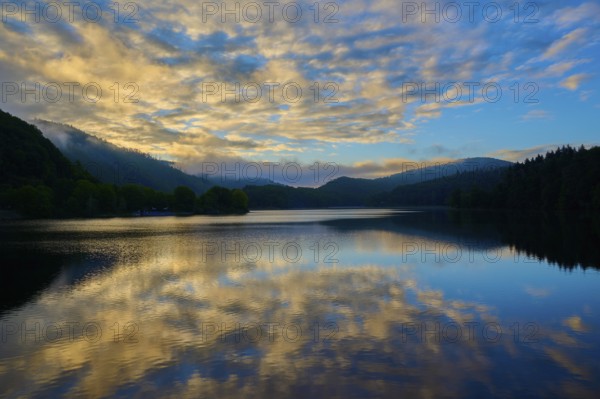 Lake with impressive cloud formations reflected in the water, summer, Rursee, Obersee, Rurberg, Simmerath, Eifel National Park, North Rhine-Westphalia, Germany