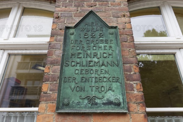 Plaque in the birthplace of Heinrich Schliemann, discoverer of Troy, Neubukow, district of Rostock, Mecklenburg-V, Germany