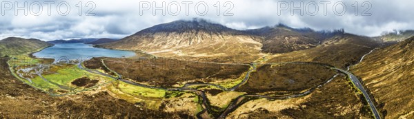 Panorama of Eas a' Bhradain Waterfall from drone, Red Cuillin mountains, Loch Ainort, Isle of Skye, Scotland, UK