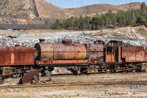 Rio Tinto mining area, destroyed nature and remains of mining activities, views along the touristic railroad line, Minas de Riotinto, Andalusia, Spain