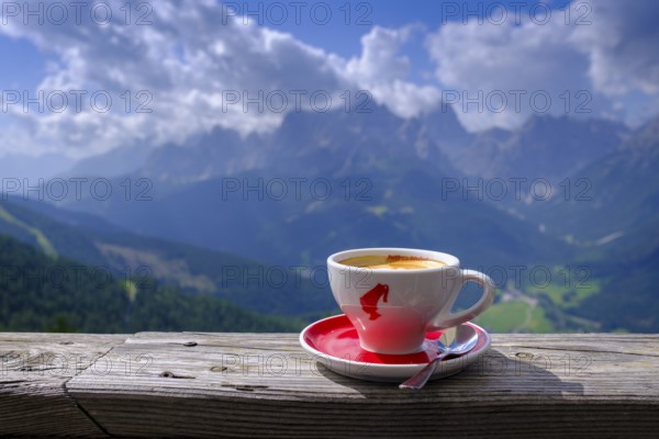 Cappuccino with a mountain view, at the Hahnspielhütte, on the Helm, Sesto, Dolomites, Val Pusteria, South Tyrol, Italy
