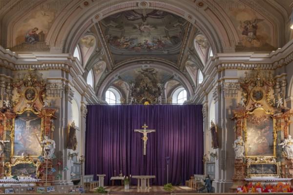 Side altars and large purple Lenten cloth in front of the high altar, baroque parish church of St Nicholas, built between 1722 and 1724, Kirchacker 20, Tannheim, Austria