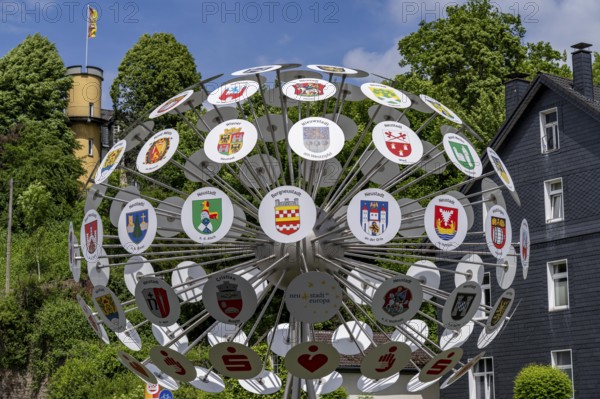 The coat of arms tree of Bergneustadt in the Oberbergischer Kreis, 102 panels show the coats of arms of new towns in Europe, Bergneustadt belongs to a group of town friendships in Europe, 37 towns and municipalities belong to it, North Rhine-Westphalia, Germany