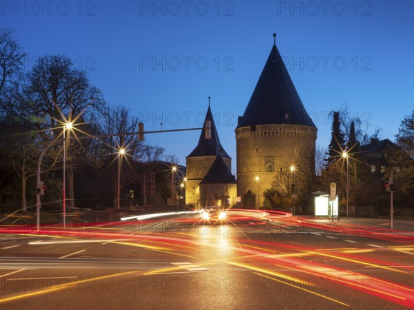 Wide Tor tor and Riesling tower at dusk with light traces of cars, part of the medieval town fortifications, Goslar, Harz, Lower Saxony, Germany