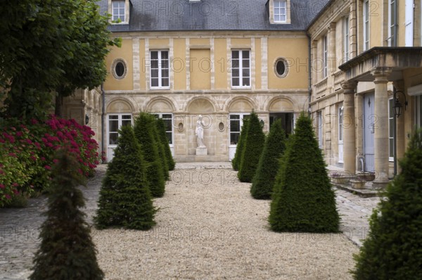 View into the courtyard of the Hotel Tardif, old town, Bayeux, Normandy, Calvados, France