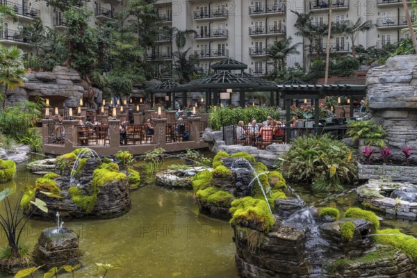 Guests dining at the Cascades American Cafe inside Gaylord Opryland Resort and Convention Center in Nashville, Tennessee