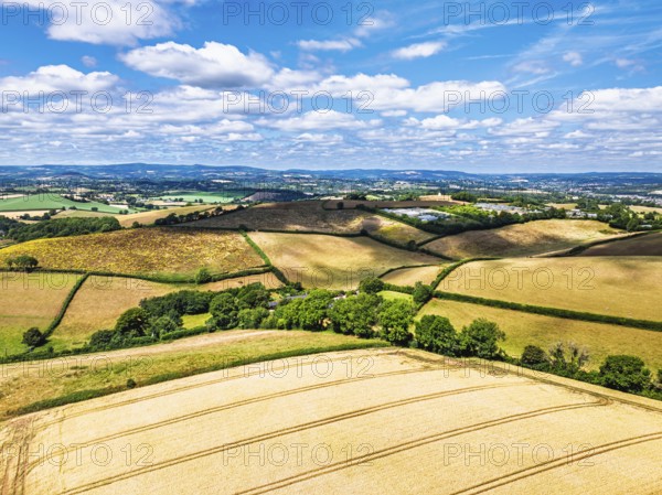 DefaultFarms and Fields over Torquay from a drone, Devon, England, United Kingdom