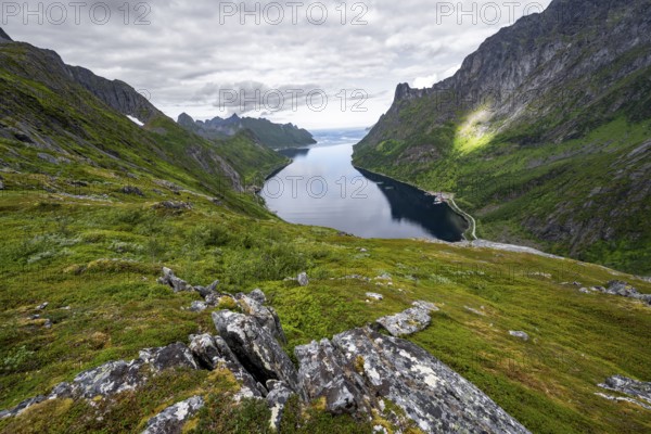 View of Øyfjorden fjord and mountains, fjord landscape with mountain peaks, hike to Barden mountain, Senja, Norway