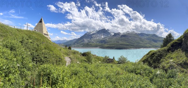 Panoramic view from plateau above Lanslebourg-Mont-Cenis to reservoir Lac du Mont Cenis left Museum Musée du Mont Cenis at pass road to pass Alpine pass mountain pass Col du Mont Cenis Colle del Moncenisio, Mont Cenis massif, Massif du Mont-Cenis, Graian Alps, Lanslebourg, Rhone-Alpes, France