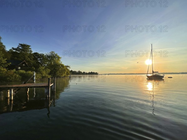 Evening atmosphere, sailing boat on Lake Starnberg, Bavaria, Germany