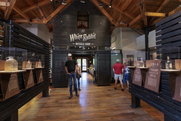 Visitors looking at display in the museum of the Jack Daniel Distillery in Lynchburg, Tennessee