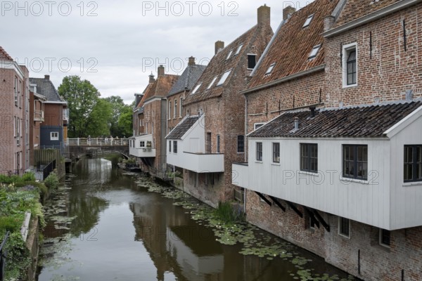 Hanging kitchens above the Damsterdiep in the historic town of Appingedam, province of Groningen, Netherlands