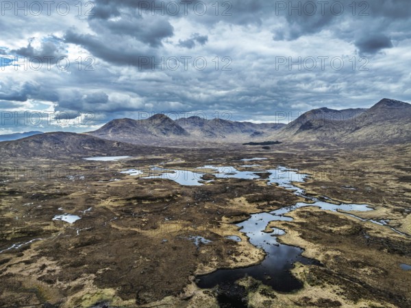 Rannoch Moor from a drone over Loch Ba and Loch of the Armpit, A82 Highland Way, Argyll and Bute, West Highlands, Scotland, United Kingdom