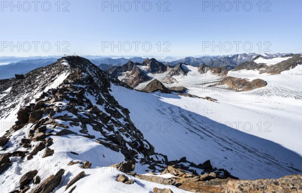 Snow on the Wilder Freiger mountain peak, picturesque high mountain landscape, view of Übeltalferner glacier and rocky mountain peaks Königshofspitz and Sonklarspitze, Stubai Alps, South Tyrol, Italy