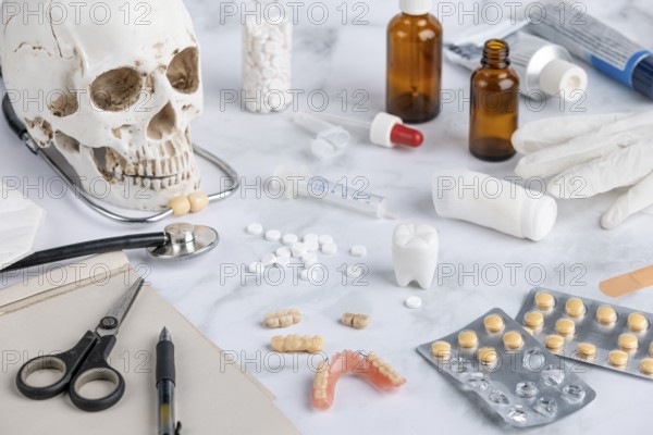 Medical utensils, tablets with skull and teeth