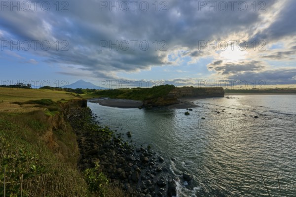 Coastal landscape with sea, cliffs and cloudy sky, calming atmosphere, Opunake, Egmont Volcano, Taranaki, North Island, New Zealand