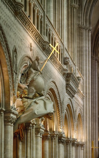 Interior view, angel on pulpit, holding a shining golden sword, Cathédrale Notre-Dame de Bayeux, Bayeux, Calvados, France
