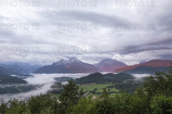 Marxenhöhe near Berchtesgaden with Watzmann view in the morning mist after the rain