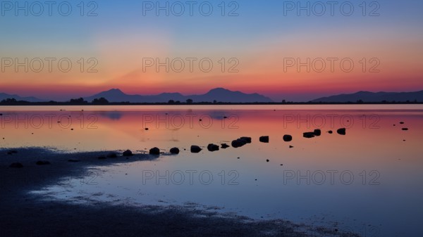 Varied colours during sunset over a calm lake, salt lake, Tigaki, nature reserve, hydro biotope, Kos, Dodecanese, Greek Islands, Greece