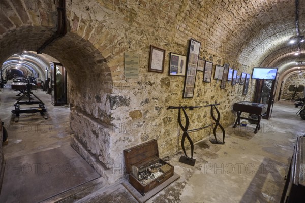 Historic cellar room with stone walls, exhibits and antique documents, war museum, military museum, tunnel museum, Lakki, Leros, WW2, Dodecanese, Greek Islands, Greece