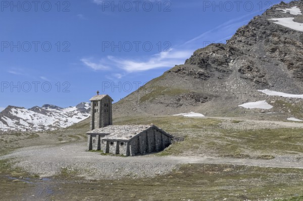 Chapel Chapelle Notre-Dame-de-Toute-Prudence next to pass road alpine road mountain road highest passable 2764 2770 metres high alpine pass Col de l'Iseran, Iseran, Iseran Pass, departmental road D902, Route des Grandes Alpes, Département Savoie, Region Auvergne-Rhône-Alpes, Graian Alps, France