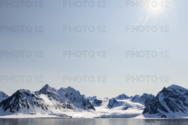 Glacier tongue, ice, mountain range, sea, sunbeams, Smeerenburg, Spitsbergen, Svalbard