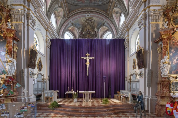 Large purple Lenten cloth in front of the high altar in the baroque parish church of St Nicholas, built between 1722 and 1724, Kirchacker 20, Tannheim, Austria
