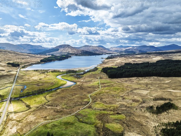 Mountains and Moors over Loch Tulla and River Orchy from a drone, Highlands, Scotland, UK