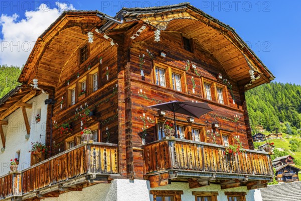 Parsonage, decorated with flowers, historic village centre, Grimentz, Val d'Anniviers, Valais Alps, Canton Valais, Switzerland