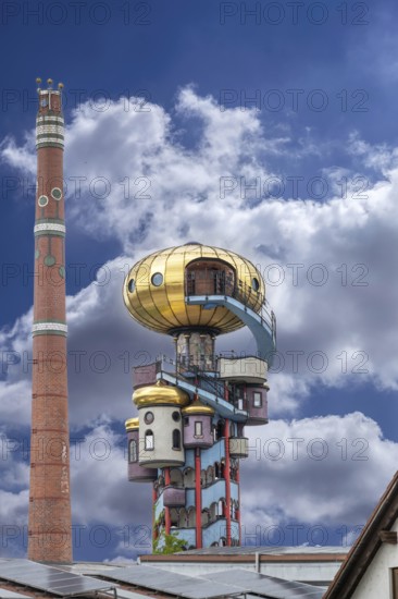 Chimney and tower of the Kuchlbauer brewery designed by Friedensreich Hunderwasser, Römerstr, 5-9, Abensberg, Lower Bavaria, Germany