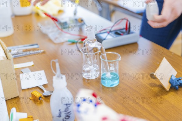 Chemistry laboratory with various laboratory equipment and liquid on the table, Battery Research, Nagold, Germany
