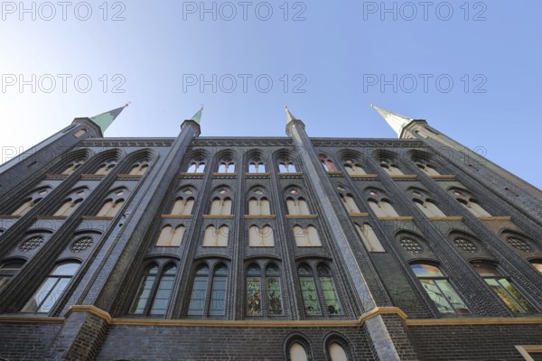 Black Gothic north side of town hall, Brick Gothic, Brick building, view upwards, perspective, clipping, Old Town, Lübeck, Schleswig-Holstein, Germany