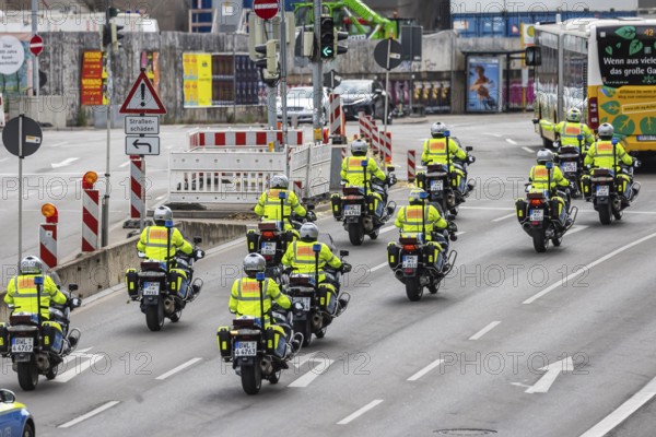 Police motorbike squadron driving through the construction sites of Stuttgart. Stuttgart, Baden-Württemberg, Germany